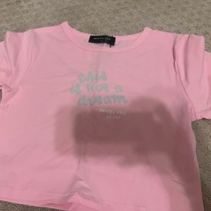 pink cropped top